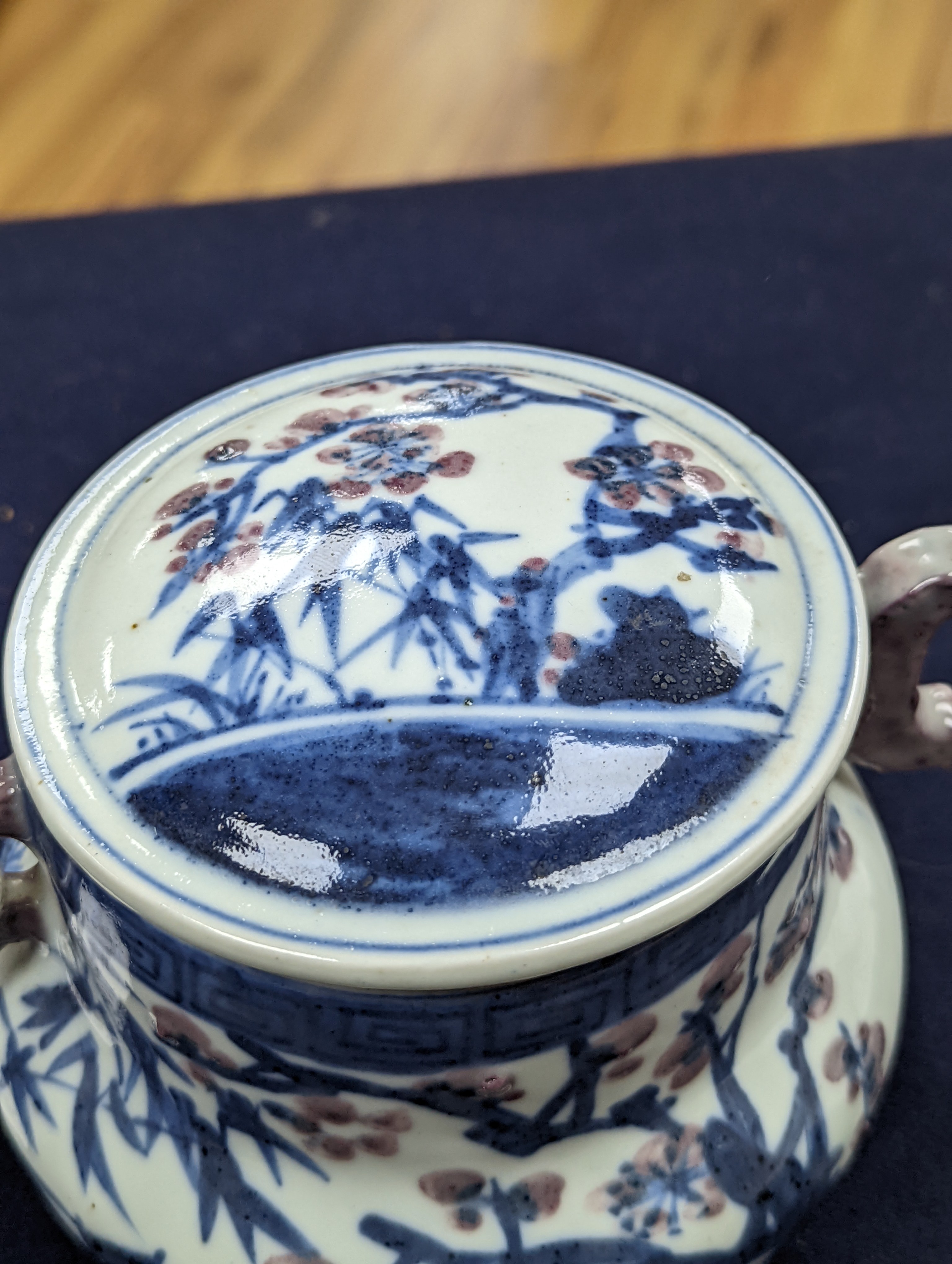 A Chinese underglaze blue and copper red jar and cover, Xuande six character mark but later 12cm